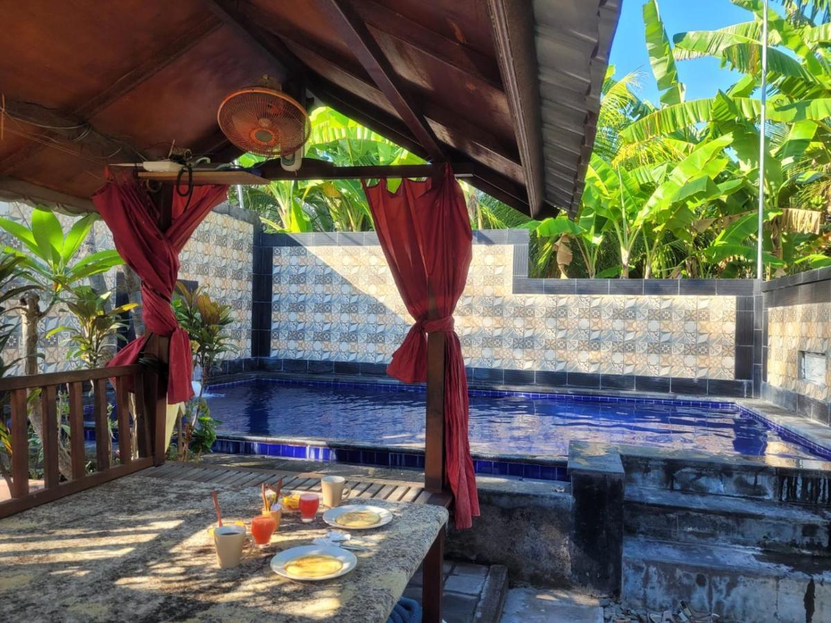 Putu Guest House Pemuteran エクステリア 写真